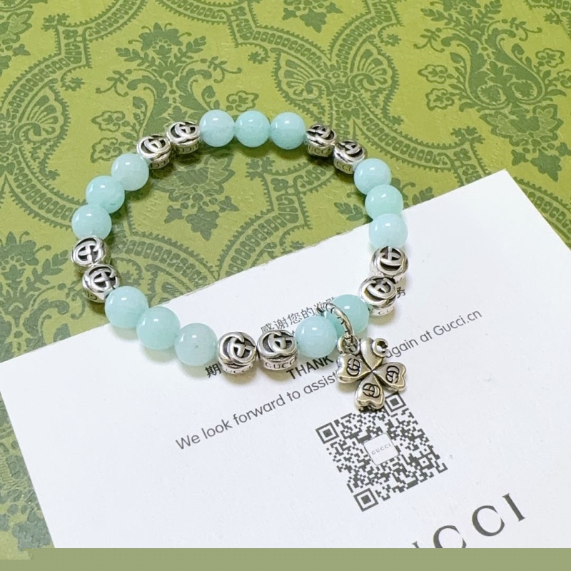 G*u*i bracelets